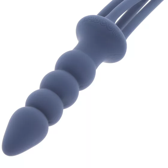 Taboom – Silicone Supreme korbács, dildós nyéllel, szilikonból